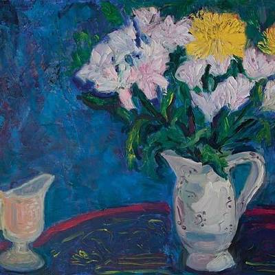 Still life in blue font